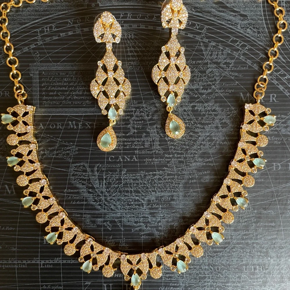Elegant Gold-Tone Necklace & Drop Earring Set with Pale Green Gem Accents
